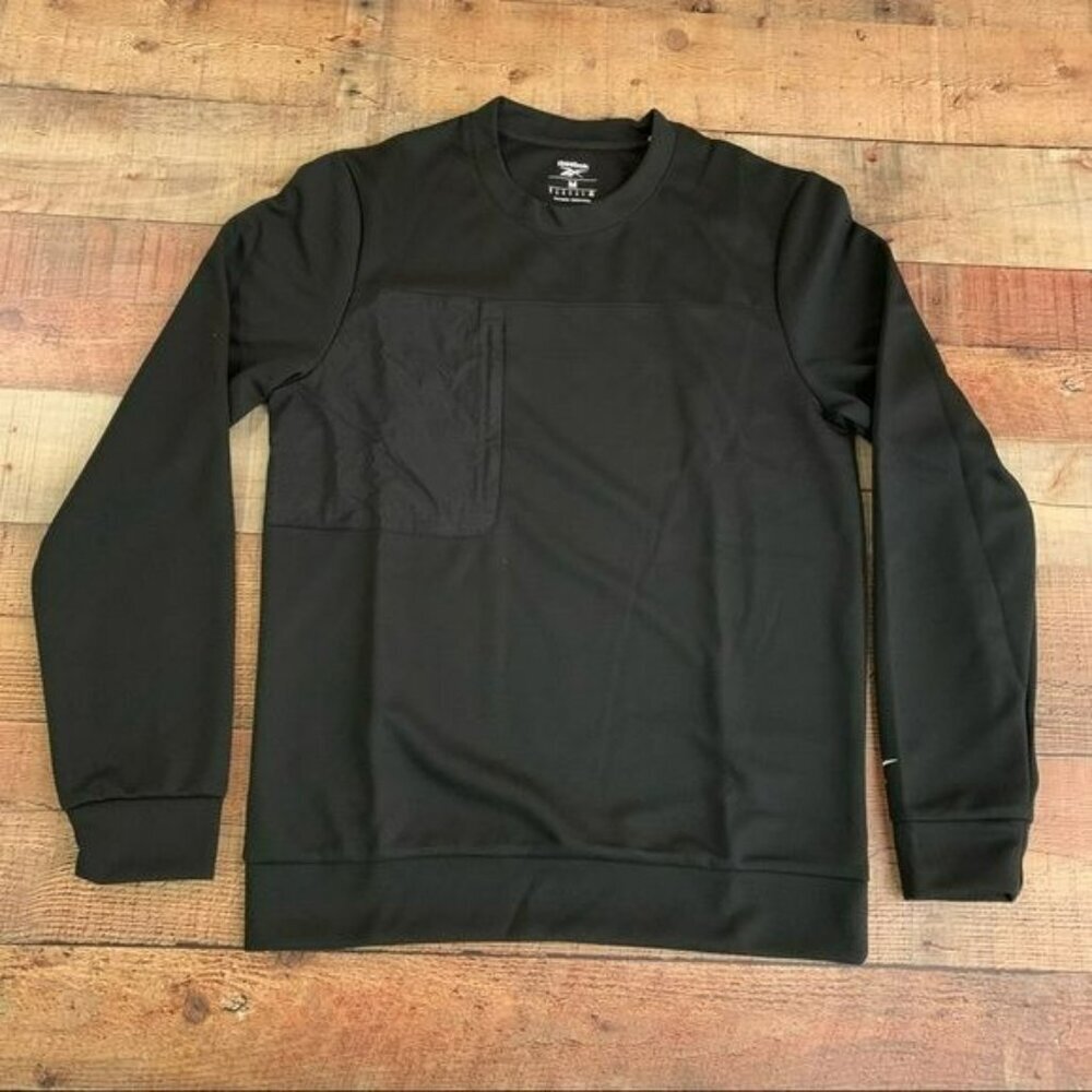Reebok men’s MYT crew neck sweatshirt with woven utility pocket in black - M